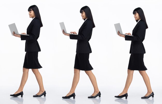 Tres Collage Longitud total de los años 20 Asia oficina de negocios Mujer de pelo corto negro usar falda de traje oscuro y zapatos. Mujer llevar portátil para trabajar y caminar vista lateral sobre fondo blanco aislado