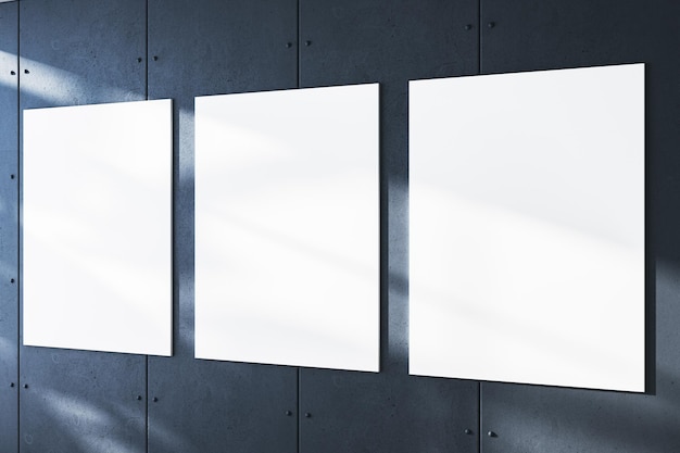 Foto tres lienzos blancos en fila en una pared de hormigón que muestran sombras de galería mostrar concepto renderización 3d