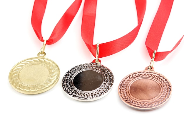 Tres medallas aisladas en blanco