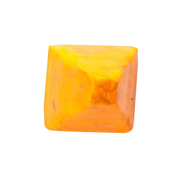 Foto triângulo de plasticina amarelo isolado em fundo branco único