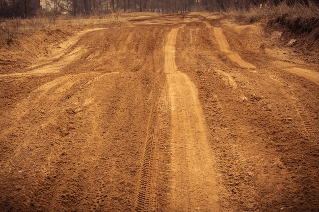 Foto trilha de roda na areia filtrada