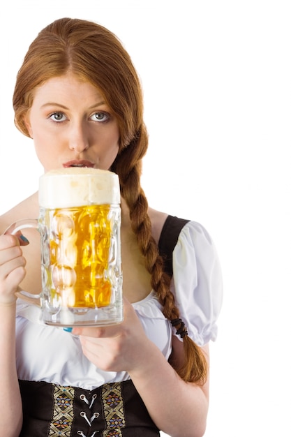 Trinkender Krug Bier des Oktoberfest-Mädchens Bier