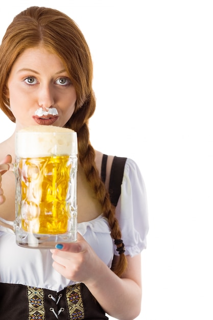 Trinkender Krug Bier des Oktoberfest-Mädchens Bier