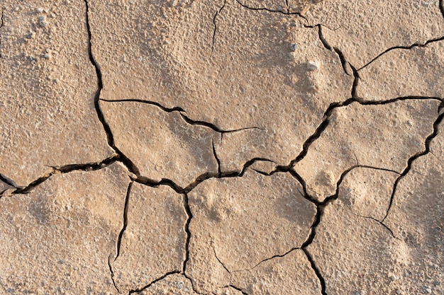 Trockene gebrochene Grundhintergrundbeschaffenheit