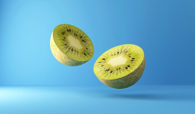 Trozos de fruta de kiwi en rodajas sobre fondo azul studio