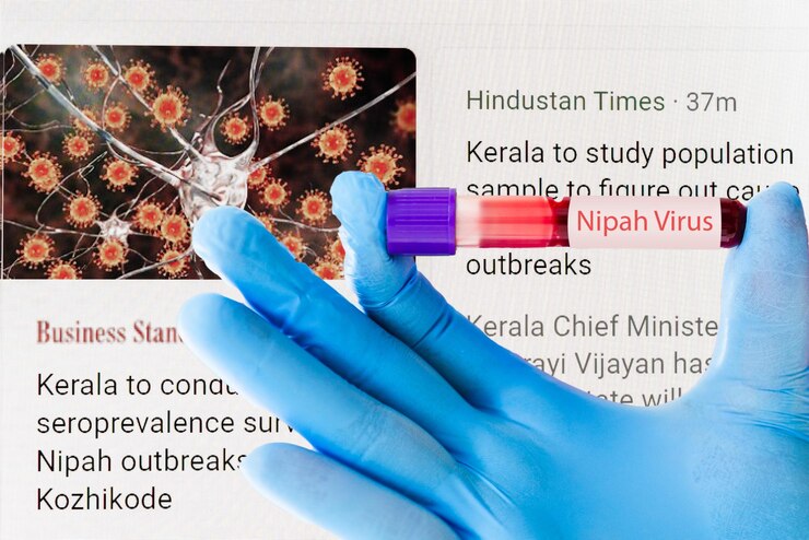 Foto tubo de muestra de sangre para la prueba del virus nipah tubo de prueba de sangre para el virus nipah niv rt pcr médica que sostiene un tubo de prueba de vidrio junto al monitor de pc concepto de virus nipah henipavirus