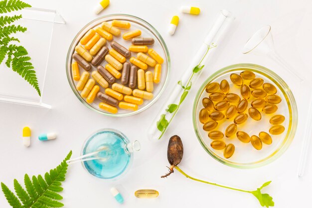 Tubos de ensayo con plantas en un soporte de vitaminas en un laboratorio de fondo claro