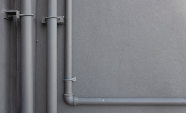 Tubulação de água closeup instalar no fundo da parede de tijolo