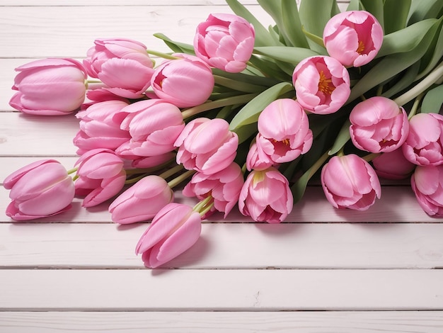 Tulipanes rosados sobre fondo blanco con textura de madera