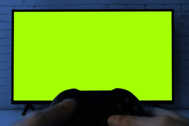 Foto tv con pantalla verde para recortar con controlador de juego