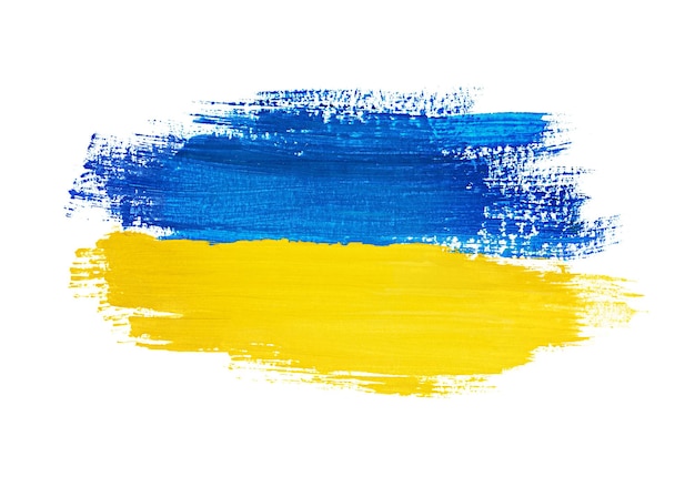 Foto ukrainische flagge gemalt mit pinselstrichen isoliert auf weißem hintergrund