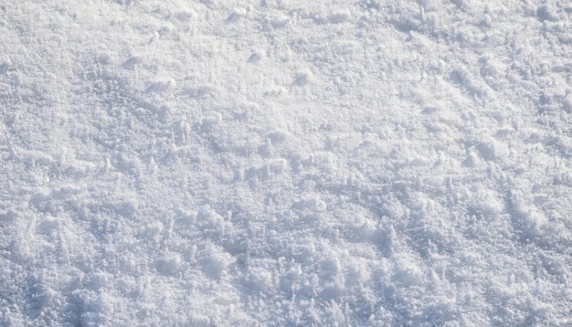 Um close de uma superfície de neve recém-caída em dezembro