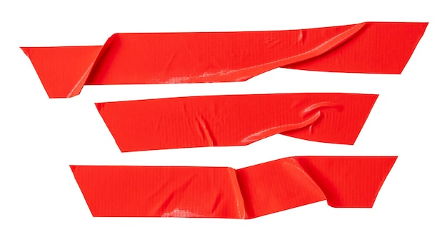 Foto um conjunto de fita adesiva vermelha ou fita adesiva de vinil em faixa é isolado em fundo branco com caminho de recorte