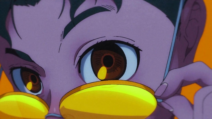 Foto um desenho animado de um pato roxo com um anel amarelo na boca