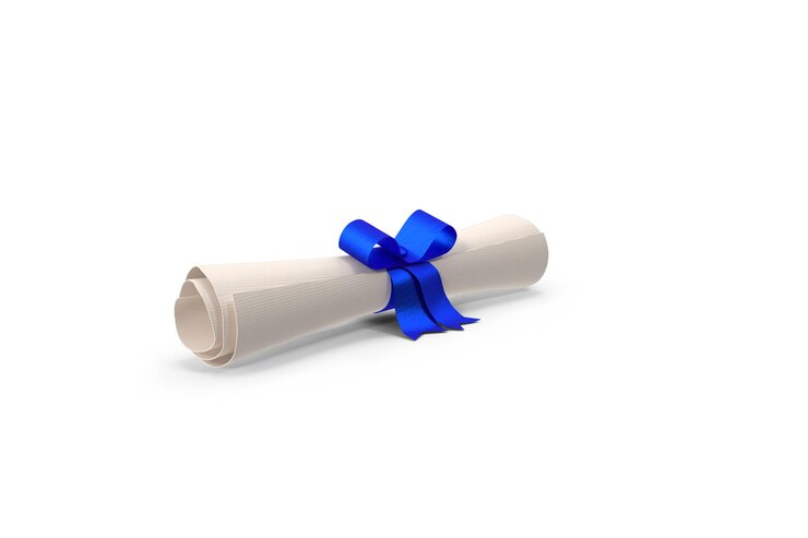 Um diploma enrolado com uma fita azul e um laço em um fundo branco.