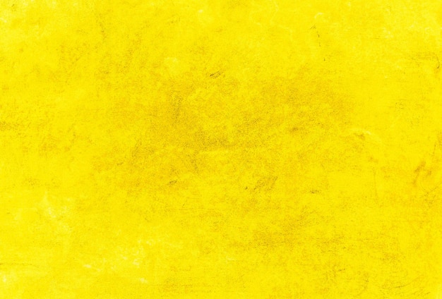 Um fundo amarelo com uma superfície texturizada