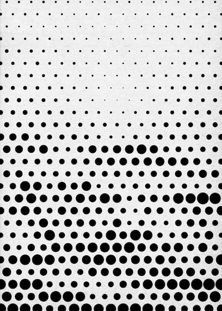 Foto um fundo branco com um padrão preto e branco de círculos e a palavra.