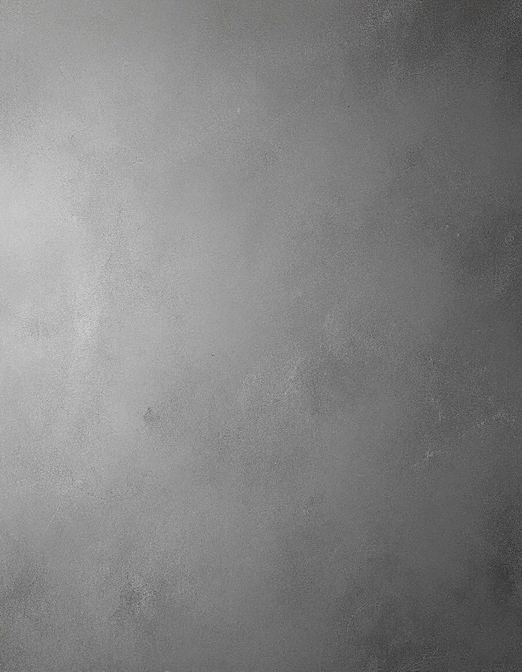 Foto um fundo cinzento com uma superfície de textura áspera e um fundo cinza escuro