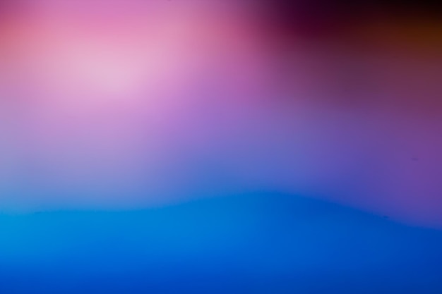 Um fundo colorido com um fundo azul e roxo.