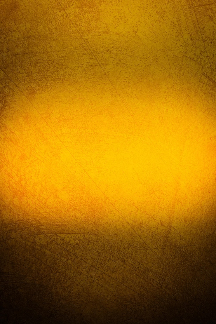 Foto um fundo texturizado dourado com uma luz sobre ele