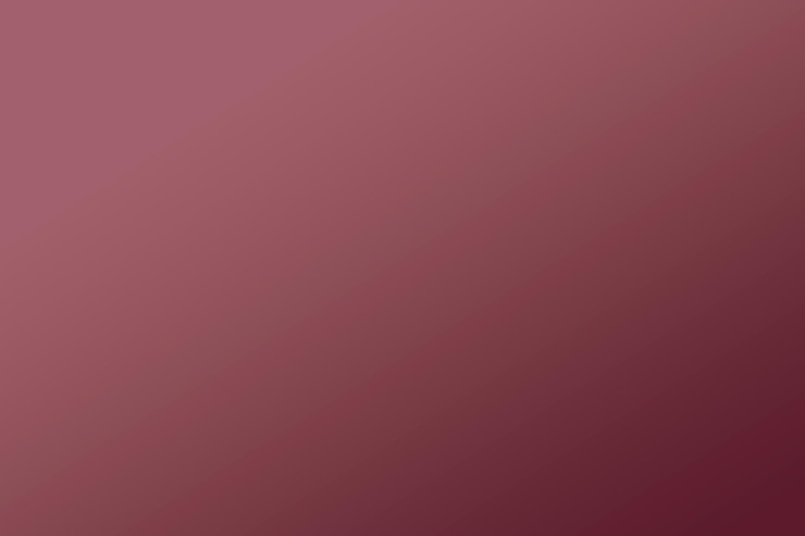 Foto um fundo vermelho com um fundo roxo escuro.