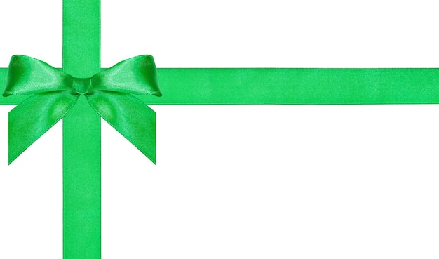 Um grande nó de laço verde em duas faixas de cetim cruzadas