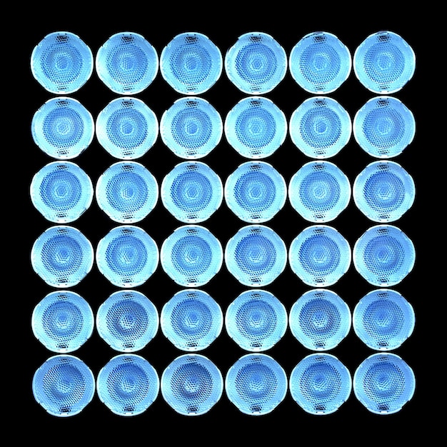 Um grupo de lâmpadas led de luz azul em close-up padrão geométrico de lâmpadas led
