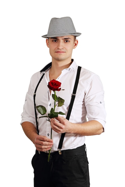 Um homem com uma rosa vermelha nas mãos. Dia dos Namorados