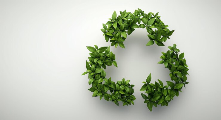 Foto um logotipo realista 3d de proteção ambiental com um símbolo de reciclagem feito de folhas verdes sobre um fundo claro