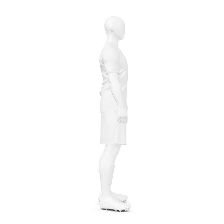 Foto um manequim com um kit de futebol completo masculino isolado em um fundo branco