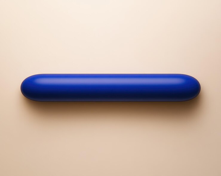 Foto um marcador azul está deitado em uma mesa com uma alça de plástico azul