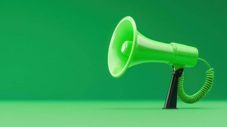 Foto um megafone verde com um fundo verde com as palavras " megafone " na parte inferior