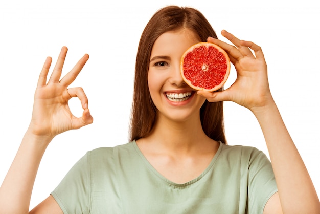 Um, menina jovem, segurando, um, laranja