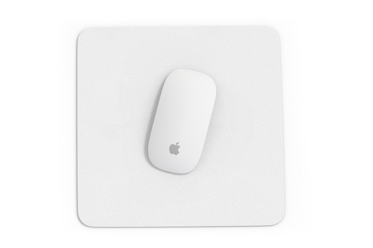 Foto um mouse pad branco com o logotipo da apple.