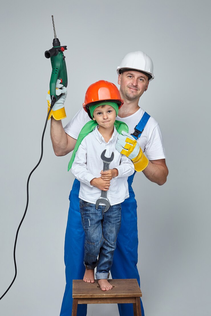Um pai com um filho pequeno o conceito da construção