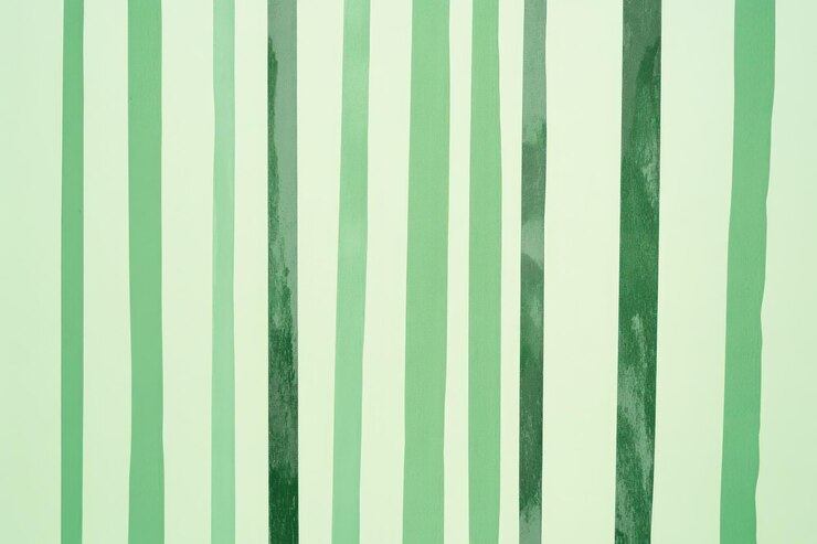 Foto um papel de parede listrado verde e branco com um padrão listrado branco e verde