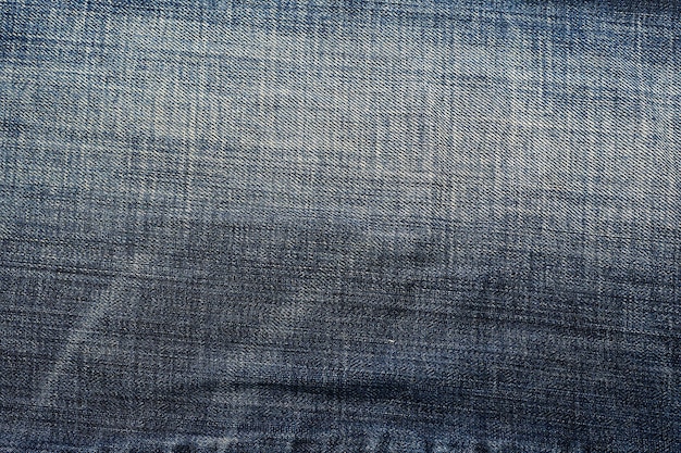 Um par de jeans azul com uma textura áspera