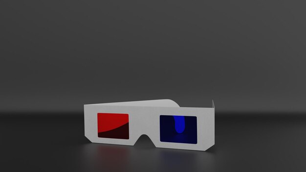 um par de óculos 3D sentados em cima de uma mesa