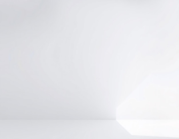 Um quarto branco simples com um feixe de luz brilhante do canto.