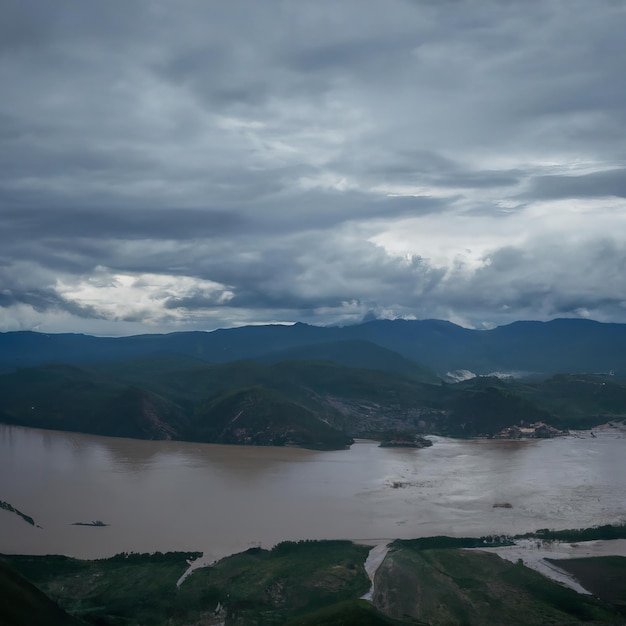 Foto um rio está ao longe e as montanhas são marrons.