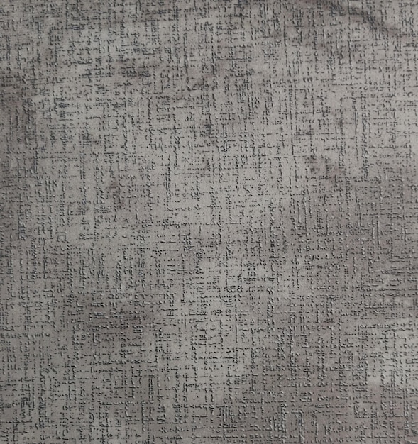 Um tapete cinza com um padrão de pequenos pontos e números.