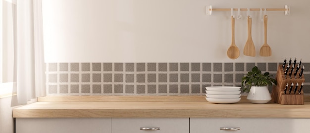 Uma bancada de cozinha de madeira minimalista com utensílios de cozinha em uma cozinha minimalista contemporânea