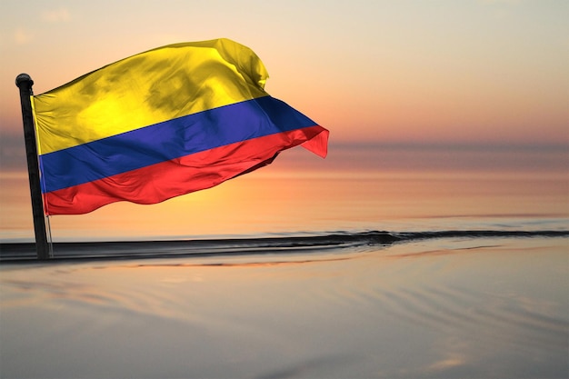 Uma bandeira nacional do país da Colômbia em um segundo plano
