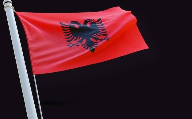 uma bandeira vermelha com um pássaro preto sobre ela está voando no vento