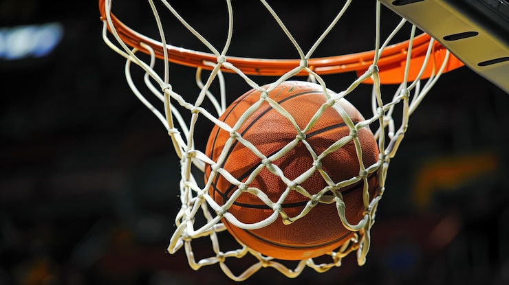 Foto uma bola de basquetebol a passar pela rede com o número 1 nela