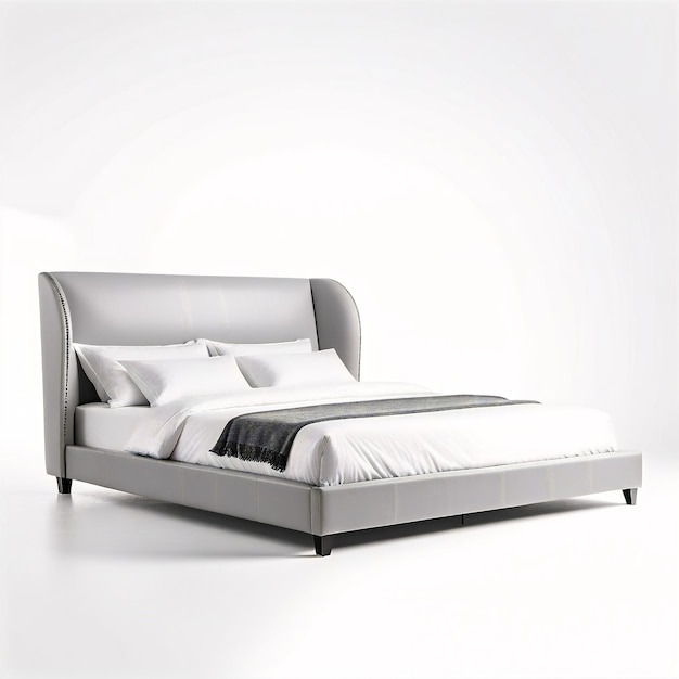 uma cama com uma cobertura de cama branca e uma cabeceira cinzenta