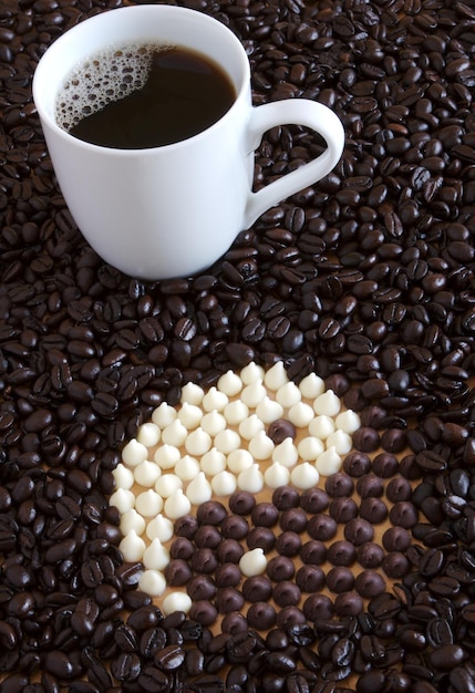 Foto uma chávena de café com uma letra o no meio
