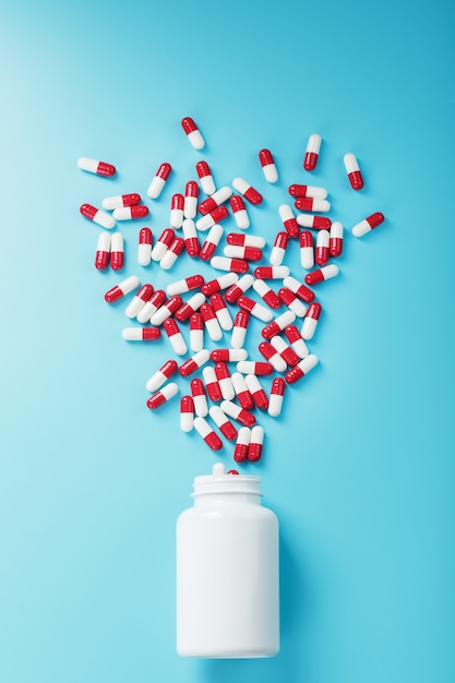 Uma dispersão de latas brancas de ampolas vermelhas e brancas com remédios e vitaminas em um fundo azul.