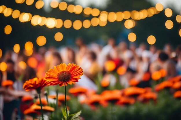 Uma flor na frente de uma multidão de pessoas na frente de um pano de fundo de luzes