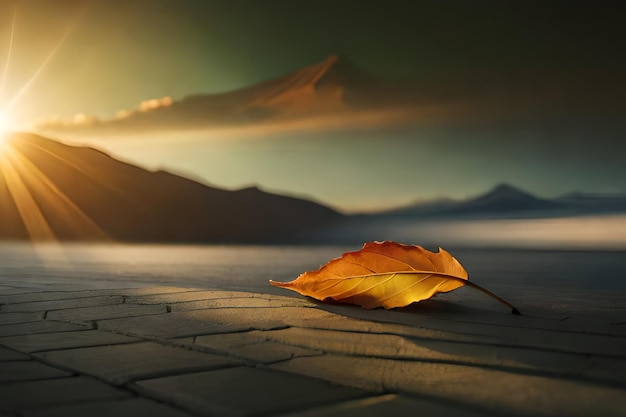 Uma folha no chão com uma montanha ao fundo